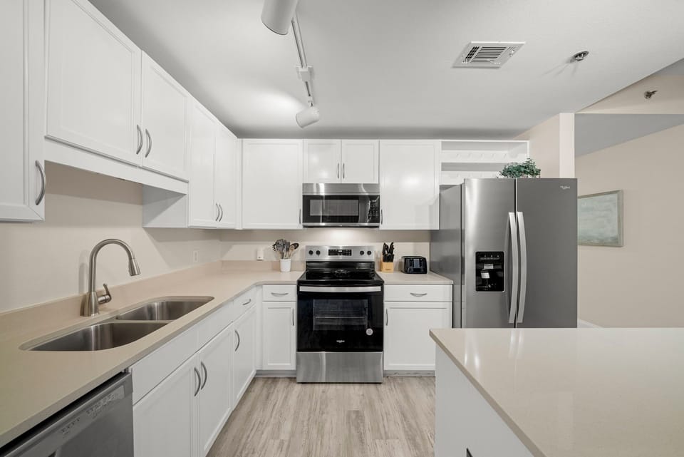 Modern kitchen with stainless steel appliances and ample counter space