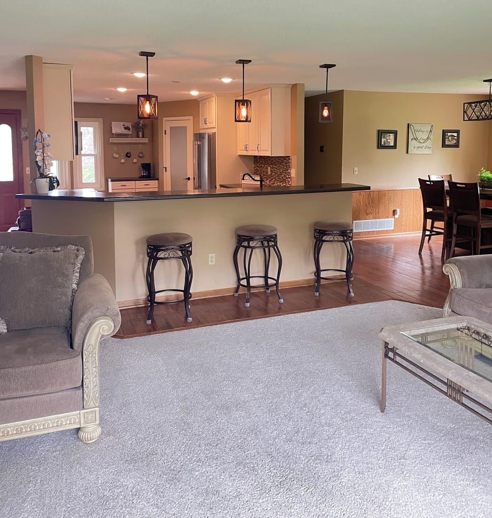 Upper Living Room and Kitchen Area