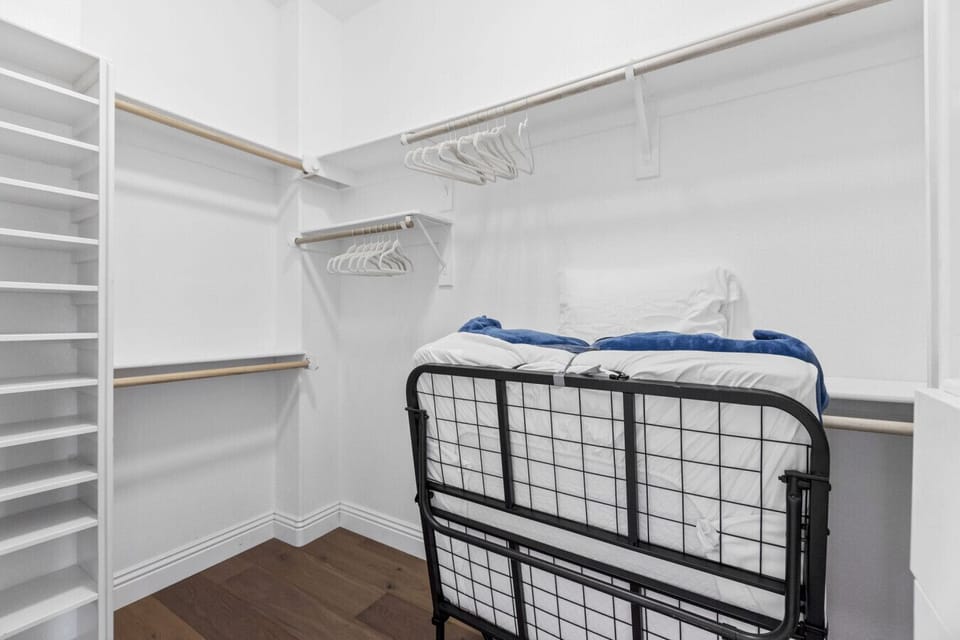 Spacious master storage closet, who knew a closet could feel so cozy?
