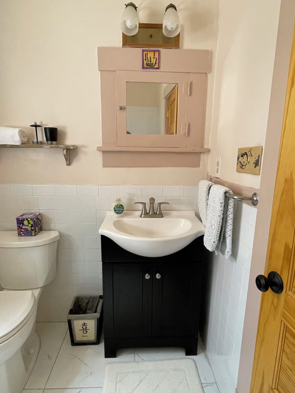 Bathroom with glass block shower.
