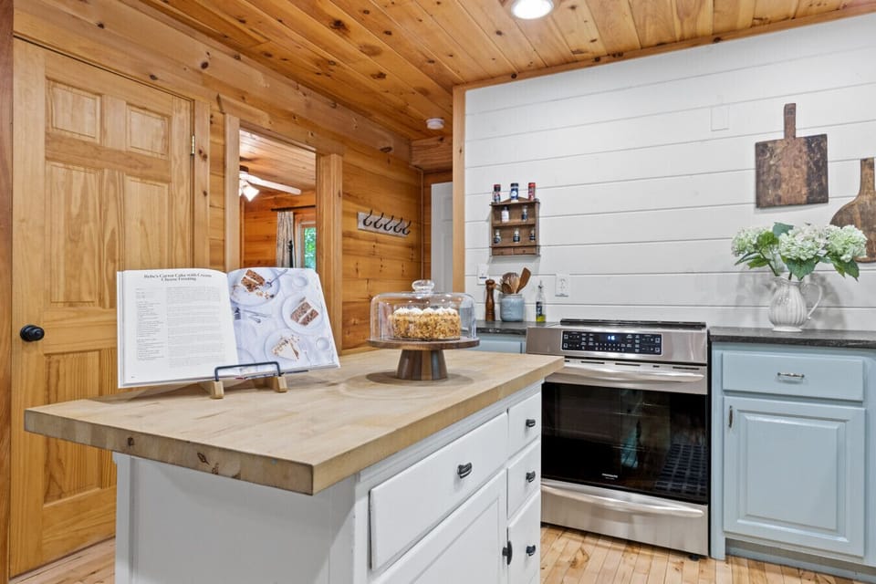 Rustic Cabin Kitchen | Stainless Steel Appliances, Butcher Block Island, and Cozy Farmhouse Décor