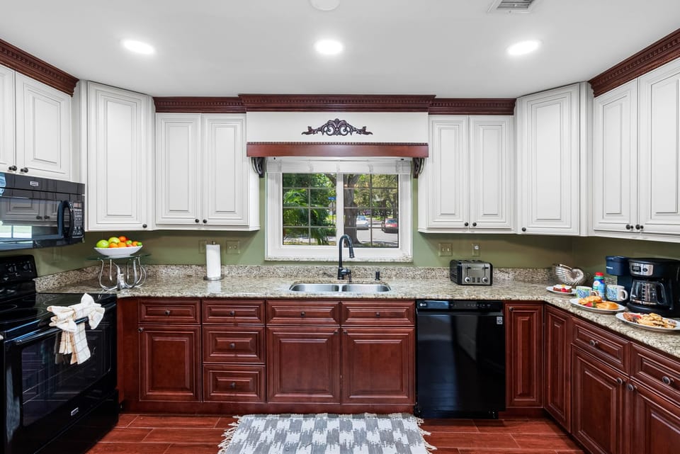 These cabinets reach to the ceiling, maximizing storage space and maintaining a clean, uncluttered look.