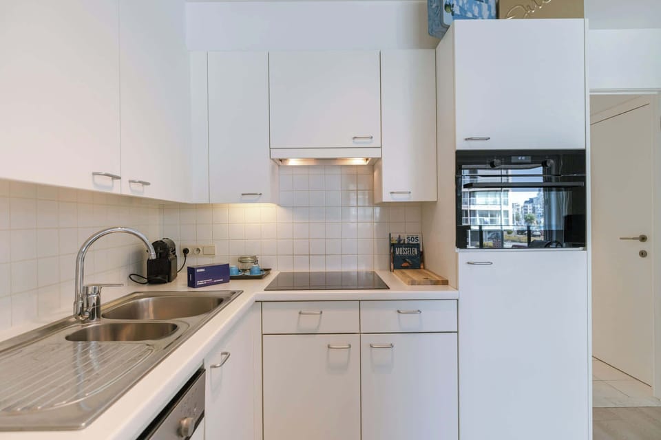 Bright kitchen with oven and cooktop