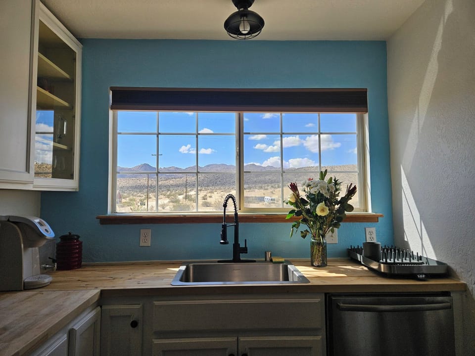 The kitchen sink with views to the valley beyond. 