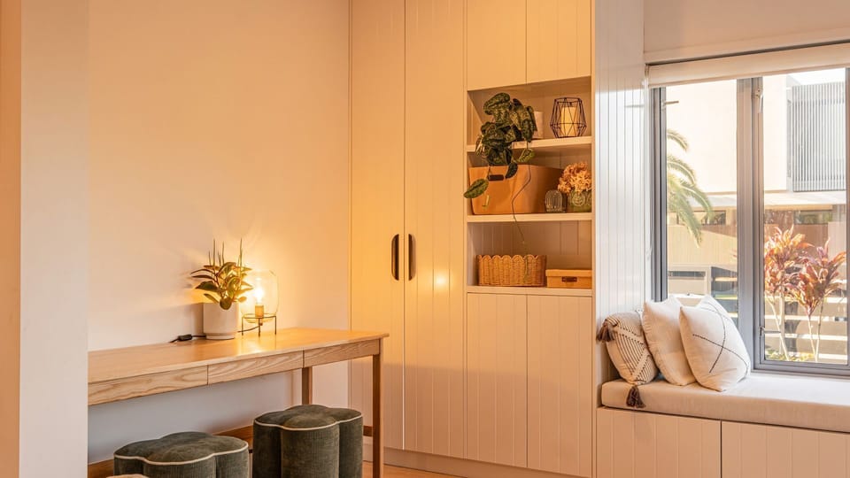 A thoughtful corner dressed in natural light and warm layers