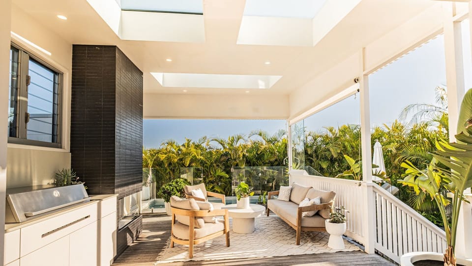Alfresco lounge with built-in BBQ and relaxed garden atmosphere