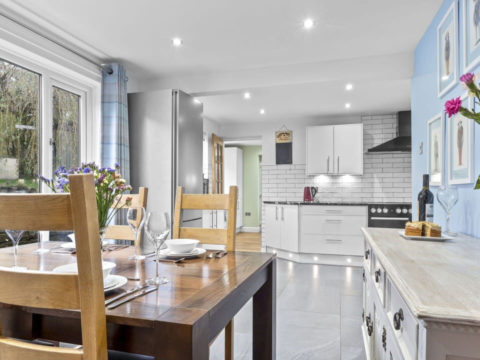 Furniture, Interior Design, Wood, Kitchen, Ceiling, Flooring, Countertop, Room, Home, Lighting