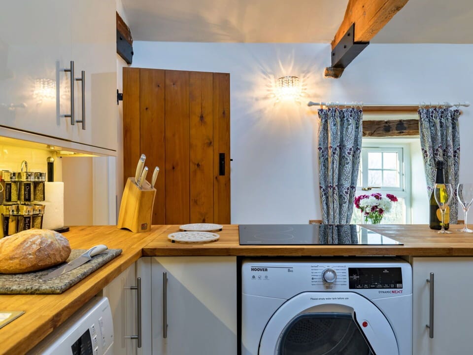 Interior Design, Flooring, Wood, Furniture, Ceiling, Floor, Room, Lighting, Countertop, Home