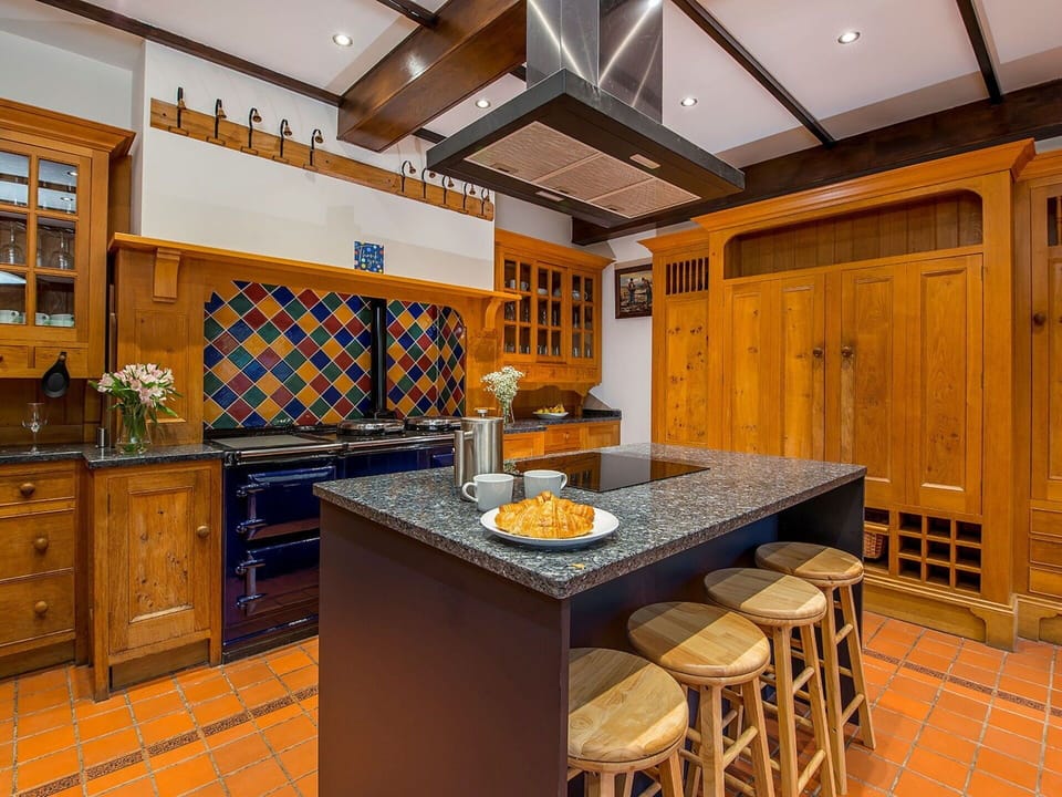 Kitchen, Flooring, Interior Design, Wood, Countertop, Cabinetry, Furniture, Floor, Kitchen Appliance, Ceiling