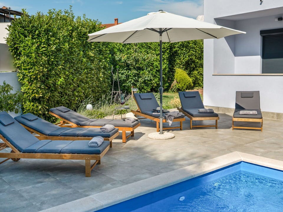 Furniture, Outdoor Furniture, Swimming Pool, Wood, Sunlounger, Chair, Umbrella, Shade, Composite Material, Resort