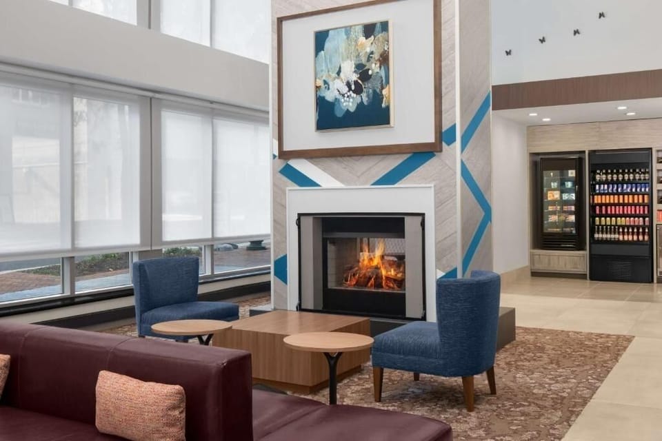 Step into a soaring, sunlit lobby designed to impress.