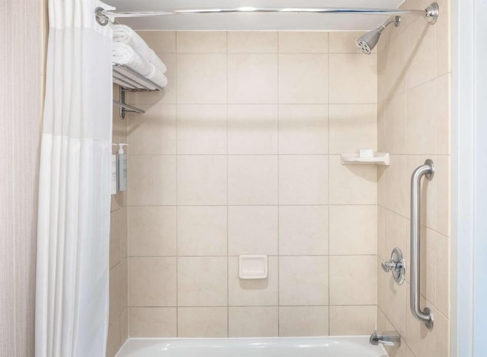 Rinse off and recharge in the clean tub-shower combo.