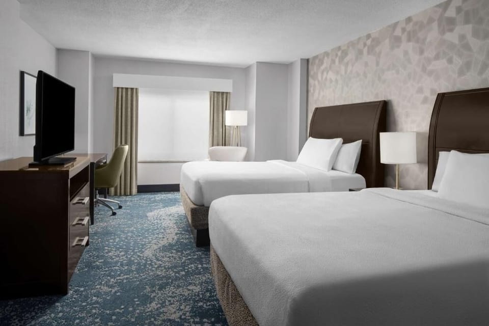 Settle in together with two comfy beds and extra space.