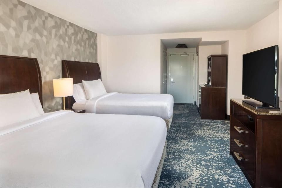 Relax with plenty of room to move between two beds.