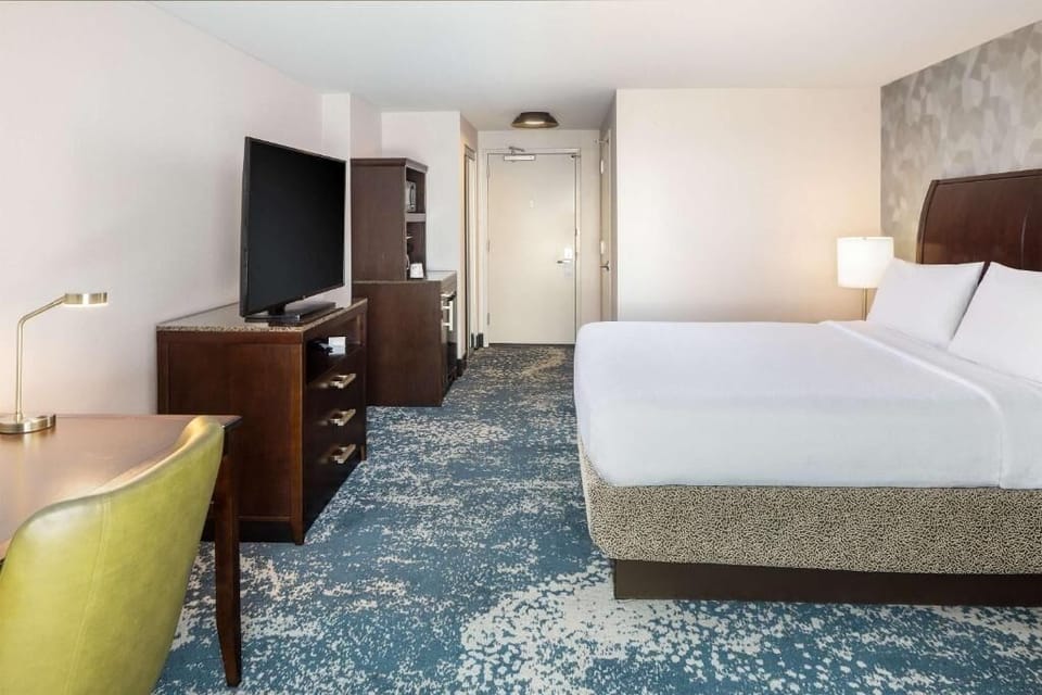 Unwind after a long day with roomy desk workspace.