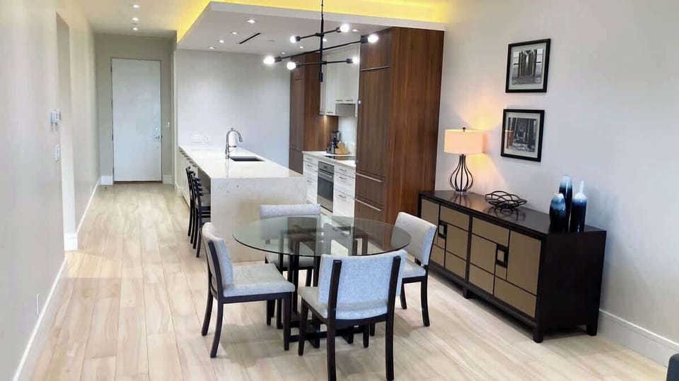 Open floor plan - view from the living room Kitchen with counter seating and dining table for 4