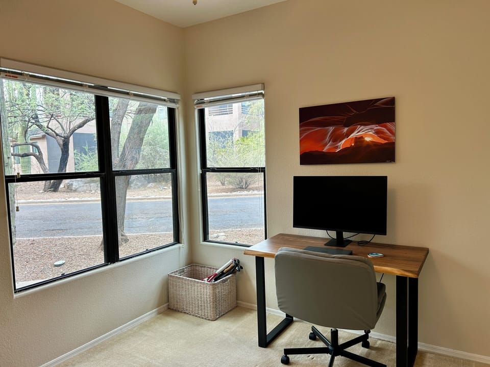 Office with monitor with easy HDMI connection for work from home away from home.
