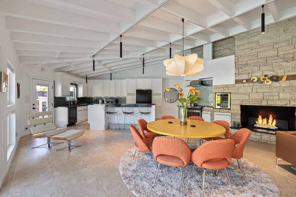 Light and bright open space with colorful midcentury decor