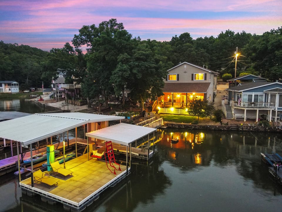 Private dock with swim platform just steps from house.