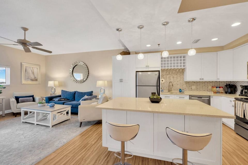 Open concept, well equipped kitchen.