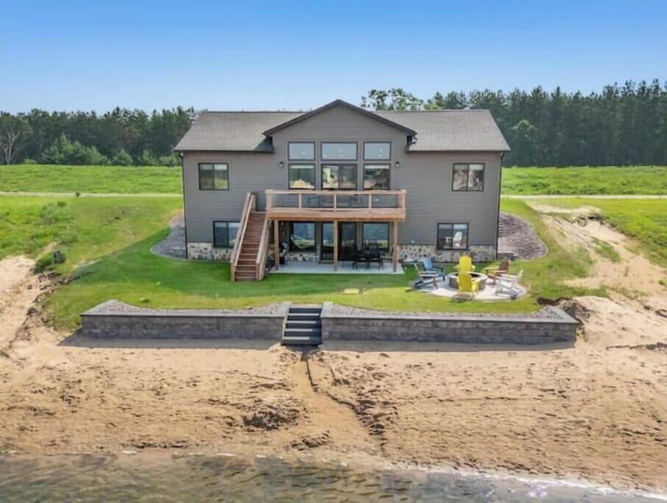 deck and patio, firepit, private access beach on Sunset Lake, outdoor activities