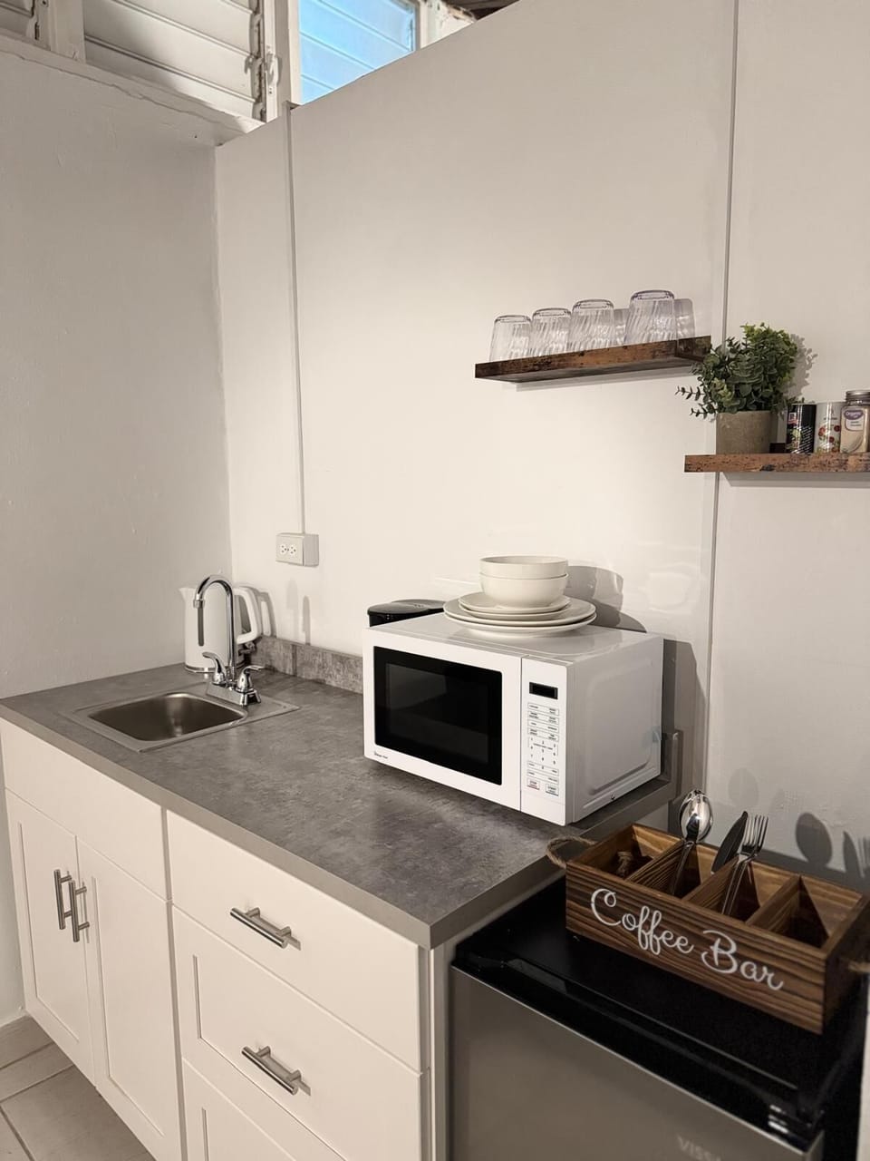 You have a microwave, coffee maker, tea kettle and a electric griddle.
