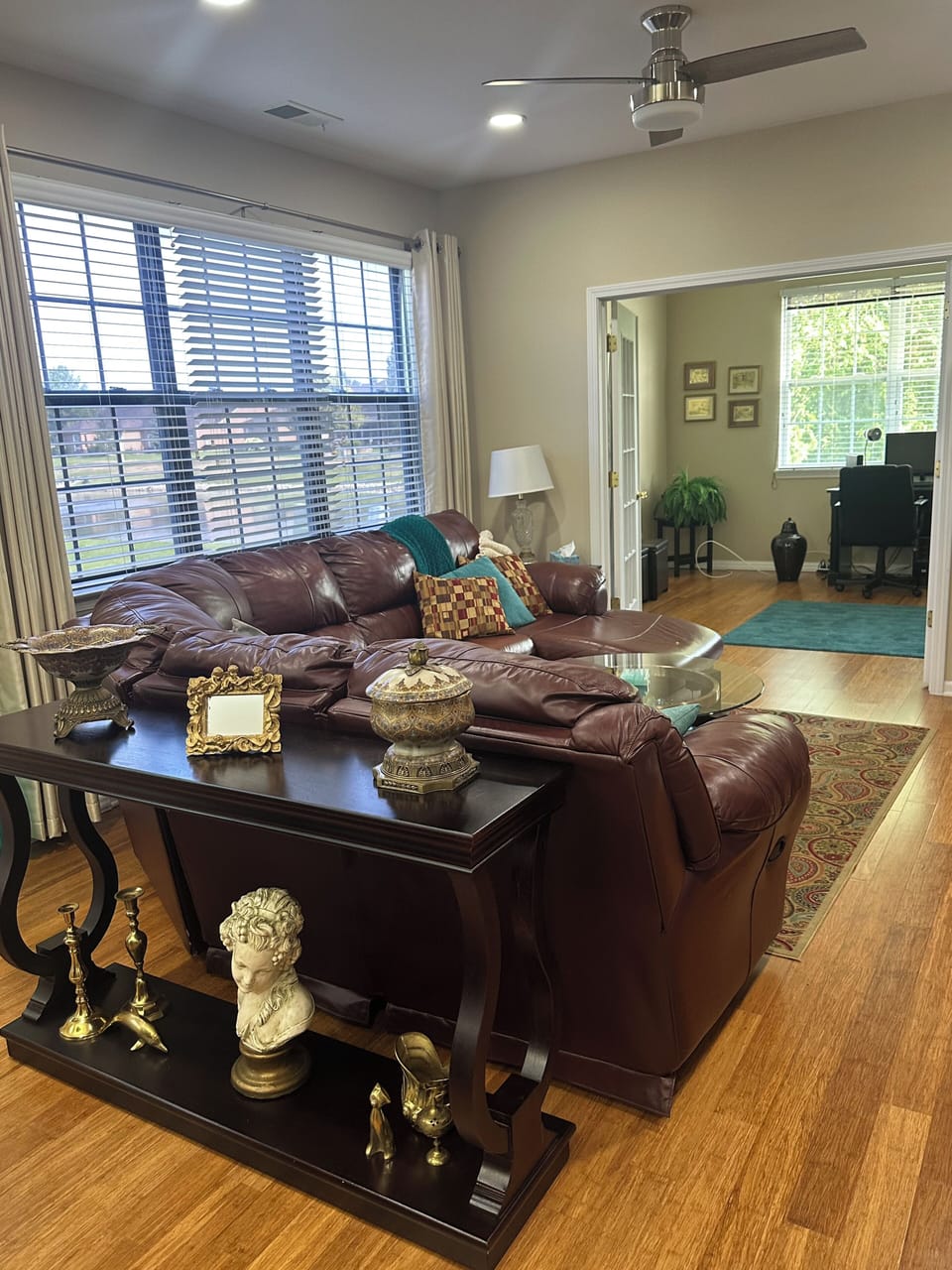 Living room has access to the office