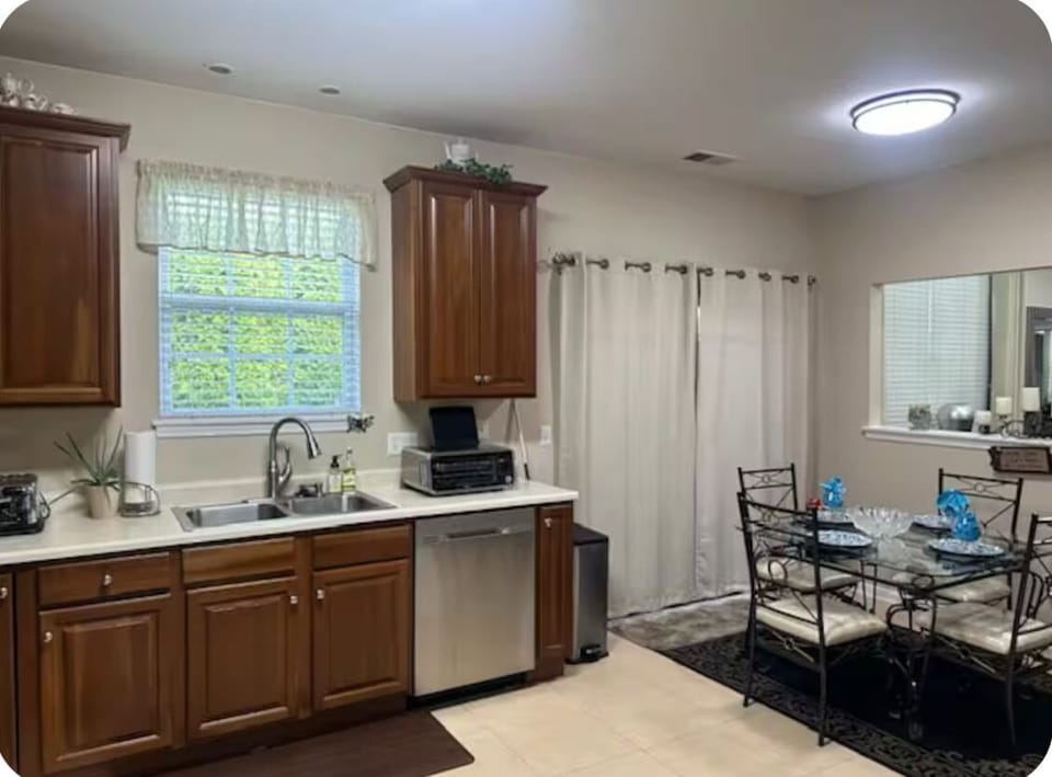 Eat-in kitchen with access to the side patio.