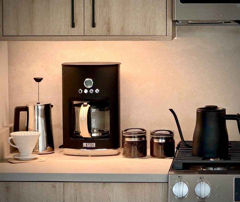 Grind fresh beans in our burr grinder and choose one of 3 great ways to make coffee.. pour over, French press & traditional drip.