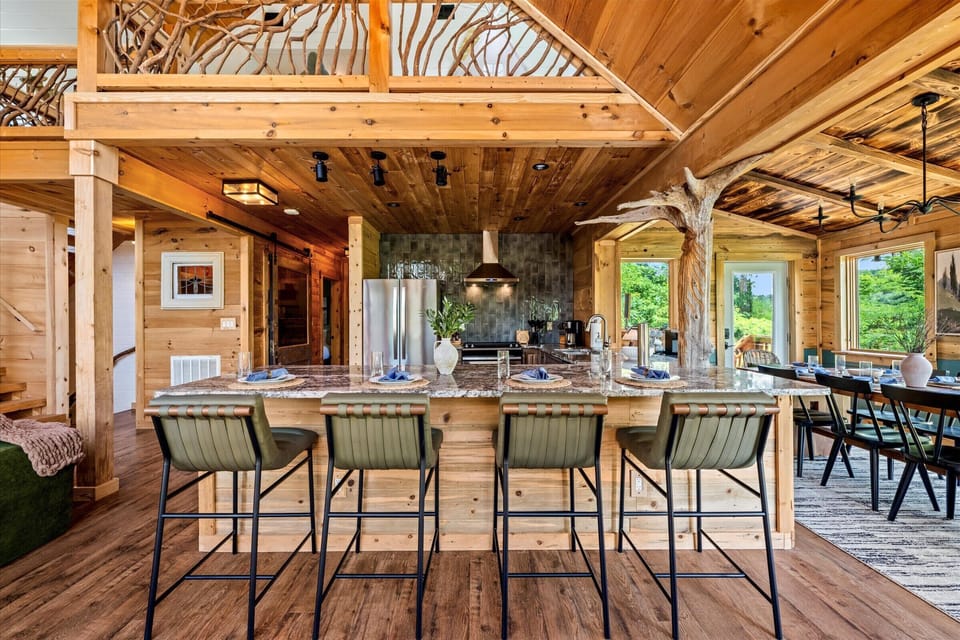This kitchen isn’t just beautiful—it’s packed with everything you need to feel right at home, including premium appliances and a generous island with high seating for your whole crew. 