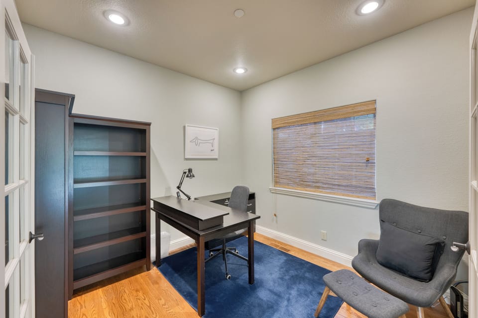 Home office with desk and chair, perfect for remote work or study.