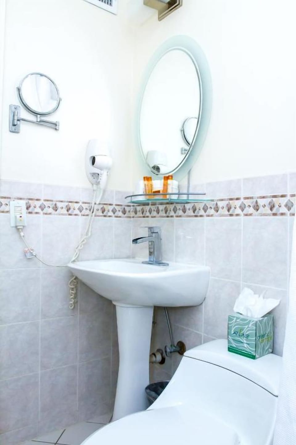 Refresh easily in the bright bath with vanity mirror.