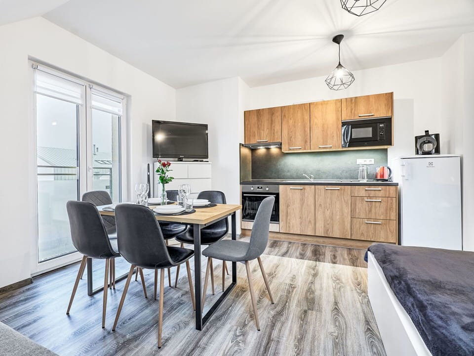 Furniture, Interior Design, Flooring, Floor, Apartment, Wood Flooring, Room, Hardwood, Chair, Plank