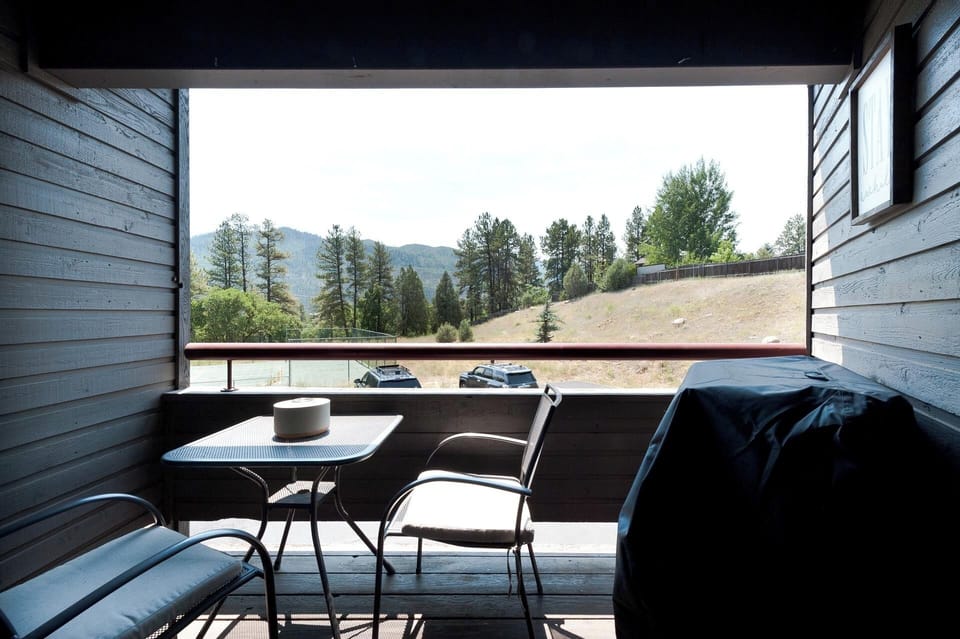 Deck off the Main Living Space with mountain views and BBQ Grill