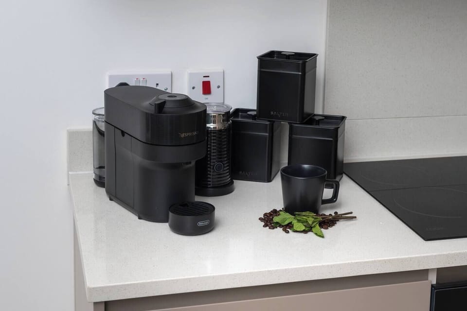 Nespresso coffee machine and a milk frotter 