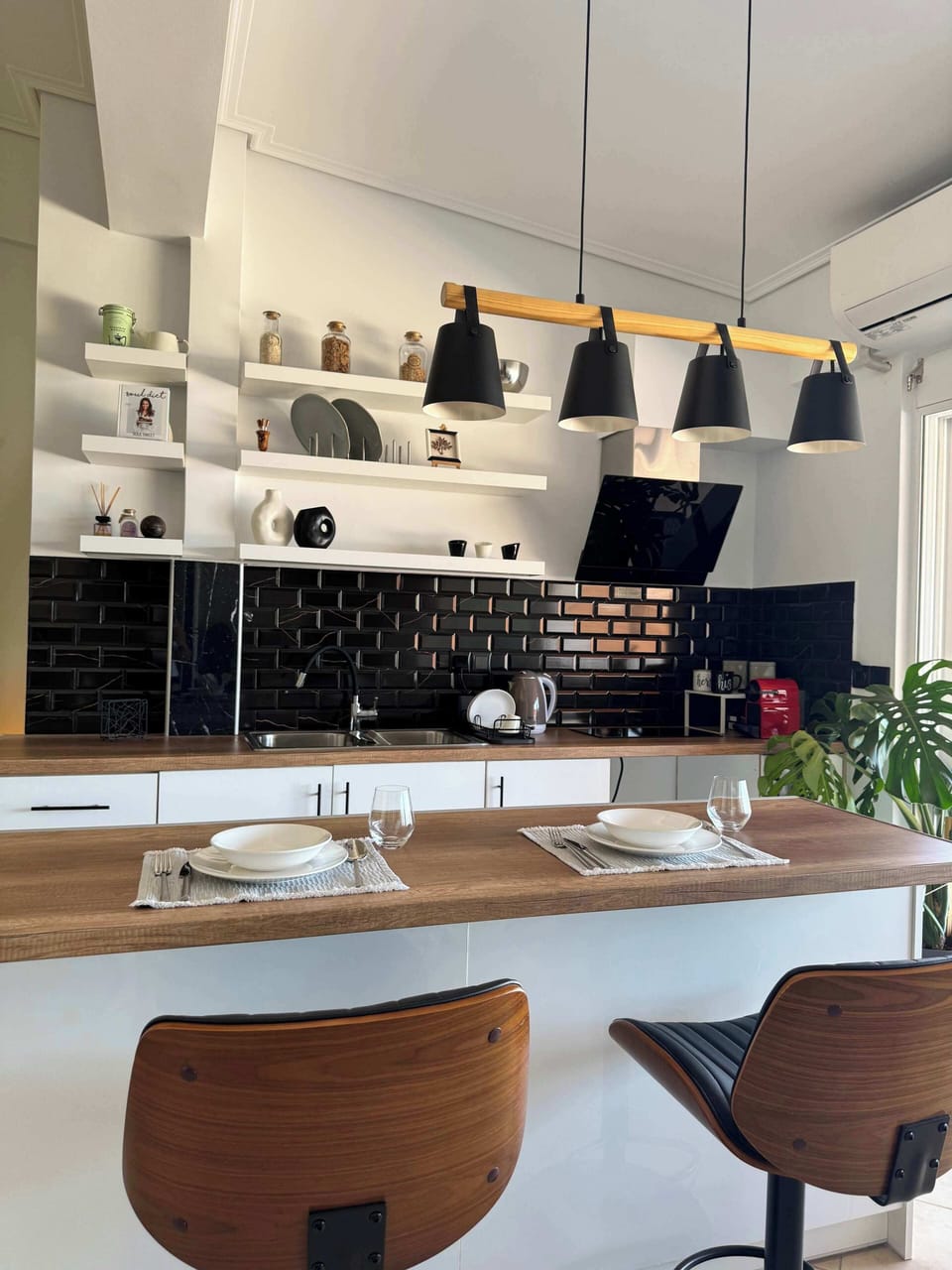 ully equipped kitchen with sleek finishes and everything you need.