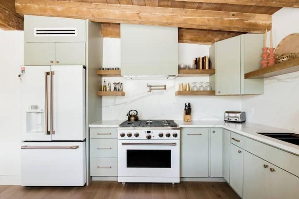 Kitchen comes with all full-size appliances as well as a coffee bar nearby.
