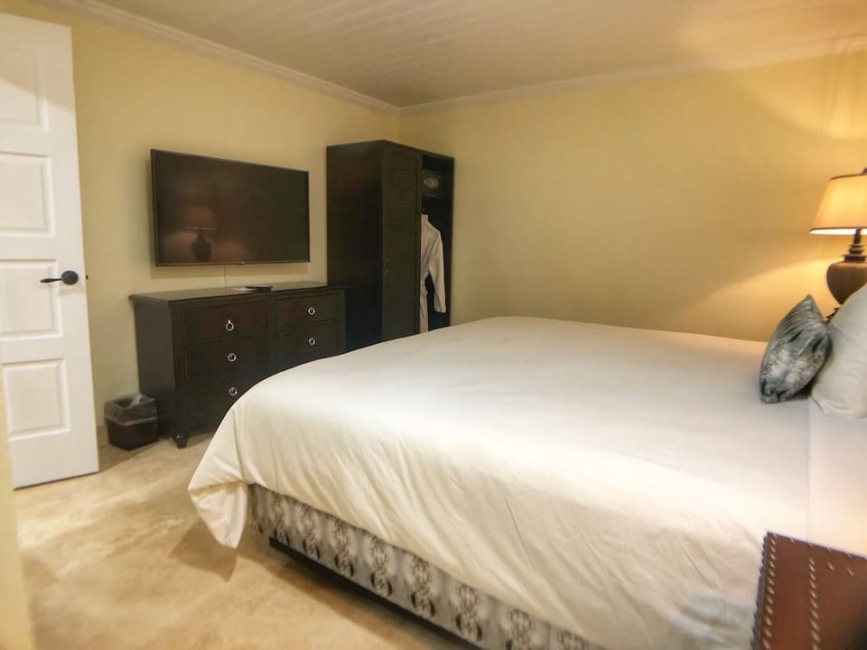 Stretch out for movie nights with TV and generous closet space.