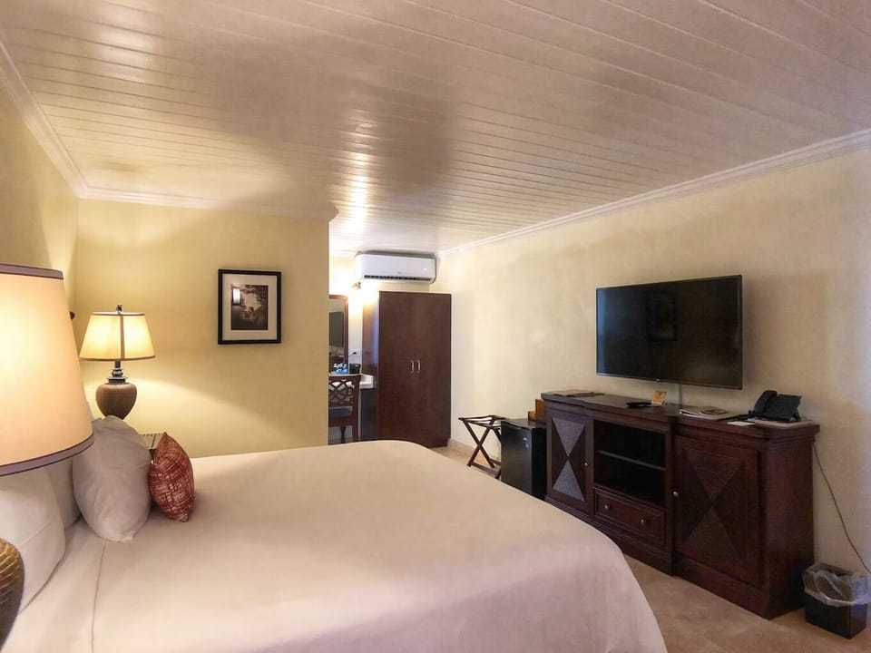Unwind with a movie night from your plush bed.