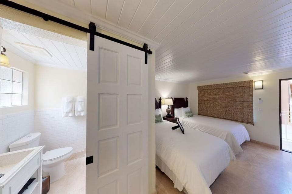 Step from bedroom ease into a fresh, spa-clean bath.