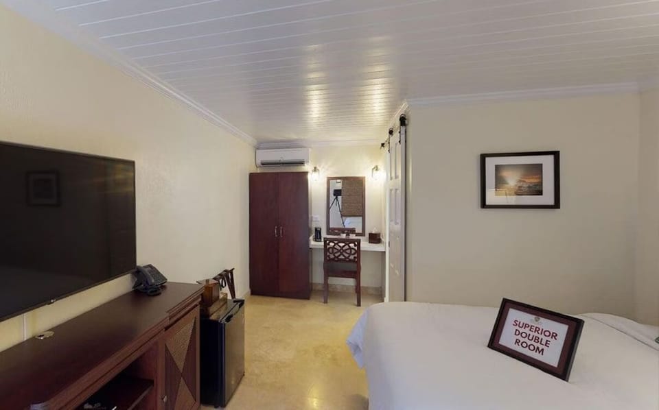 Recharge with simple comforts, big-screen TV, and handy desk.