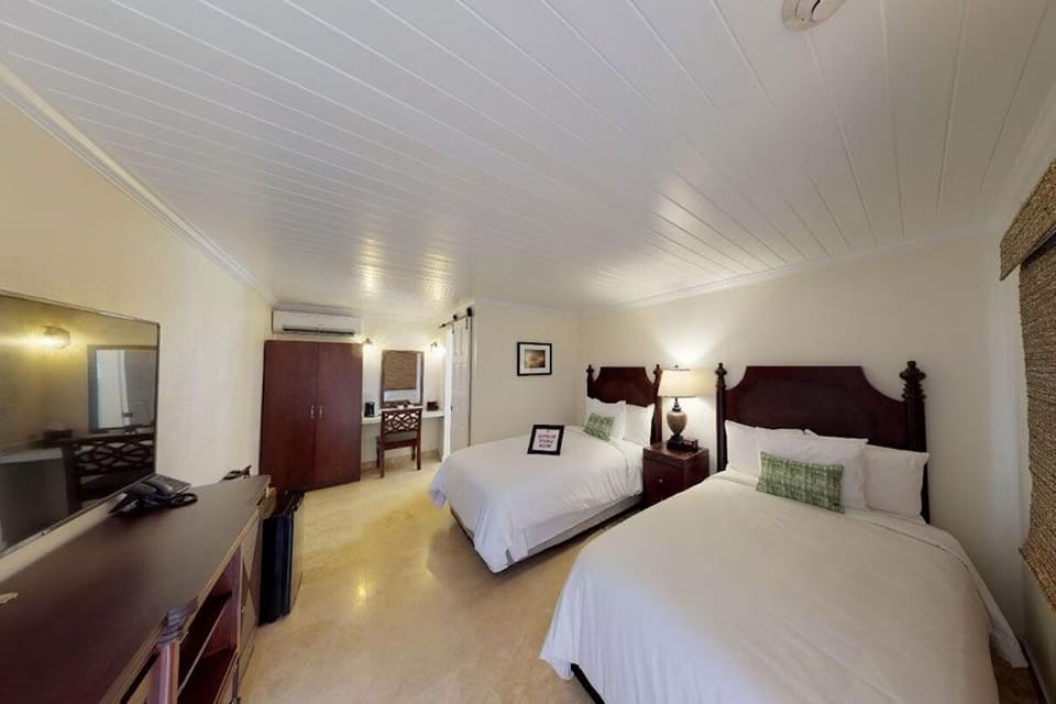 Spread out in a roomy double-queen retreat with AC comfort.