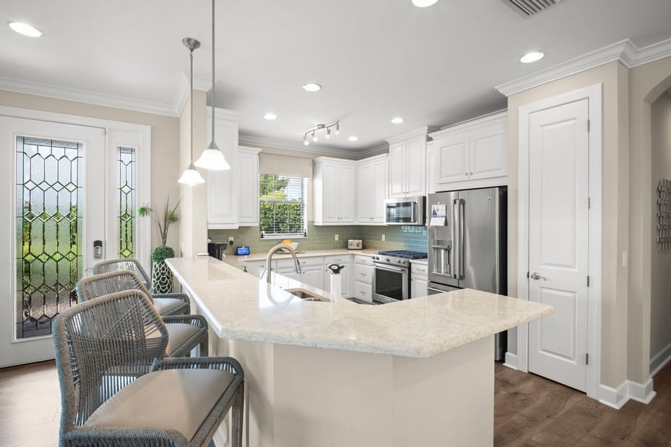 Open kitchen with stainless steel appliances