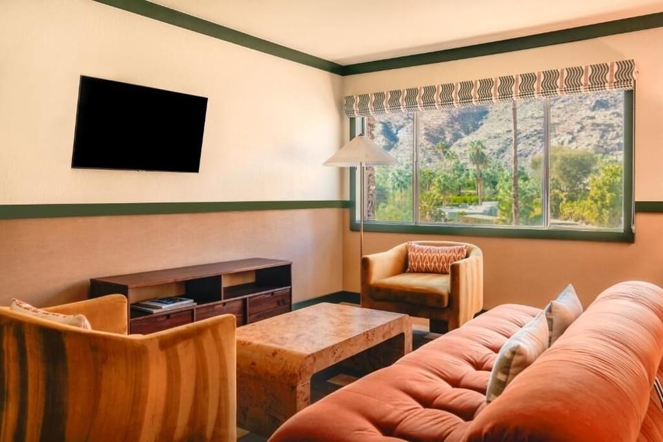 Kick back on the sofa for movies and sunny mountain scenery.