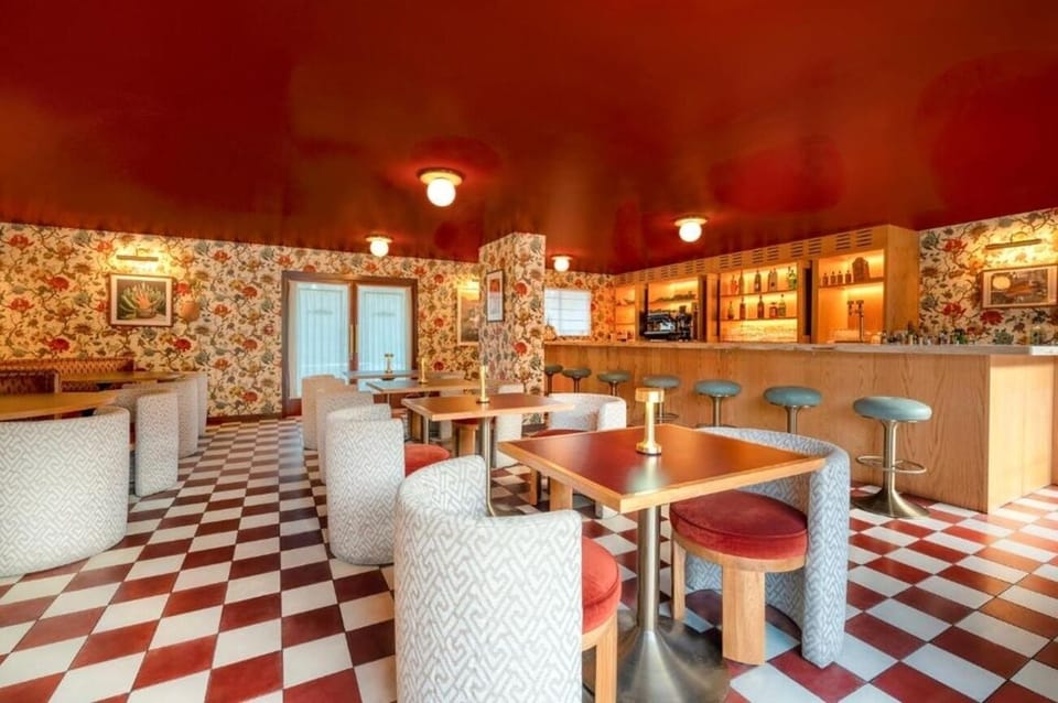 Settle into retro lounge seating for relaxed dining and drinks.