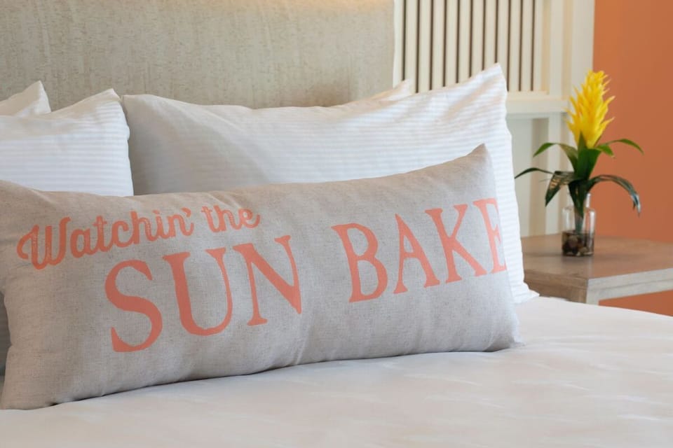 Sink into soft pillows and savor slow, sunny mornings.
