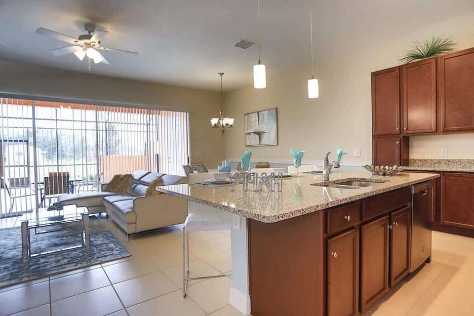 Gather with family in this bright, open-plan living and kitchen space-perfect for meals and relaxing together!