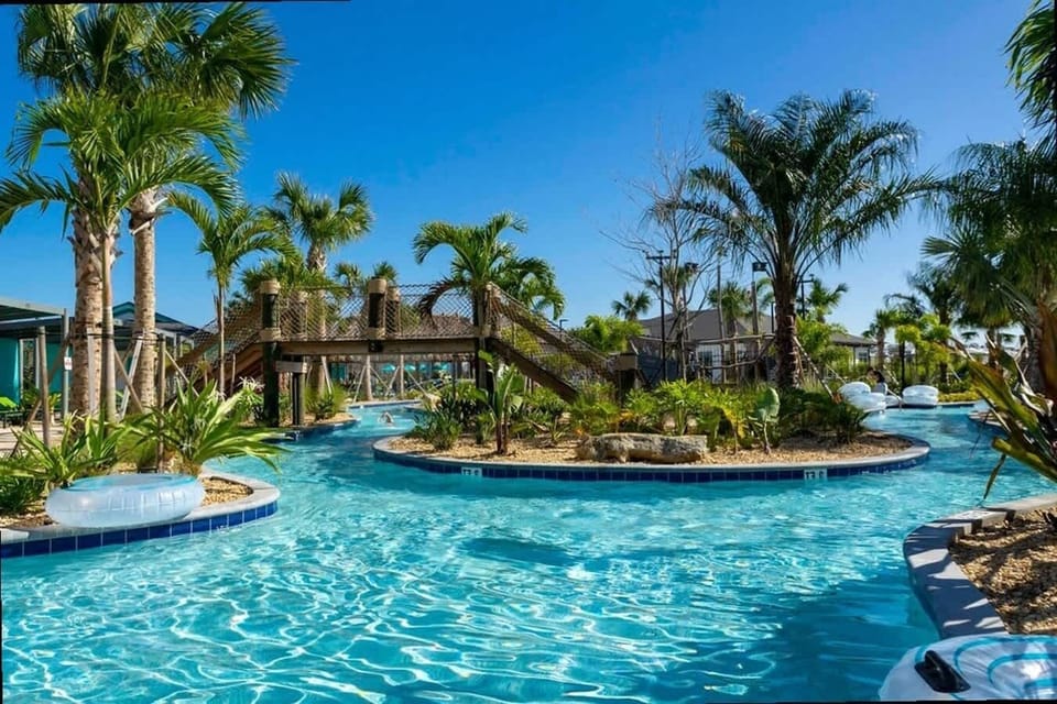Cruise through refreshing waters under palm trees and bridges-this serene lazy river is the ultimate way to unwind and soak up the sunshine.