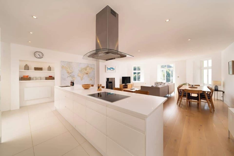 The open plan kitchen comes fully equipped with all you could need for your stay.
