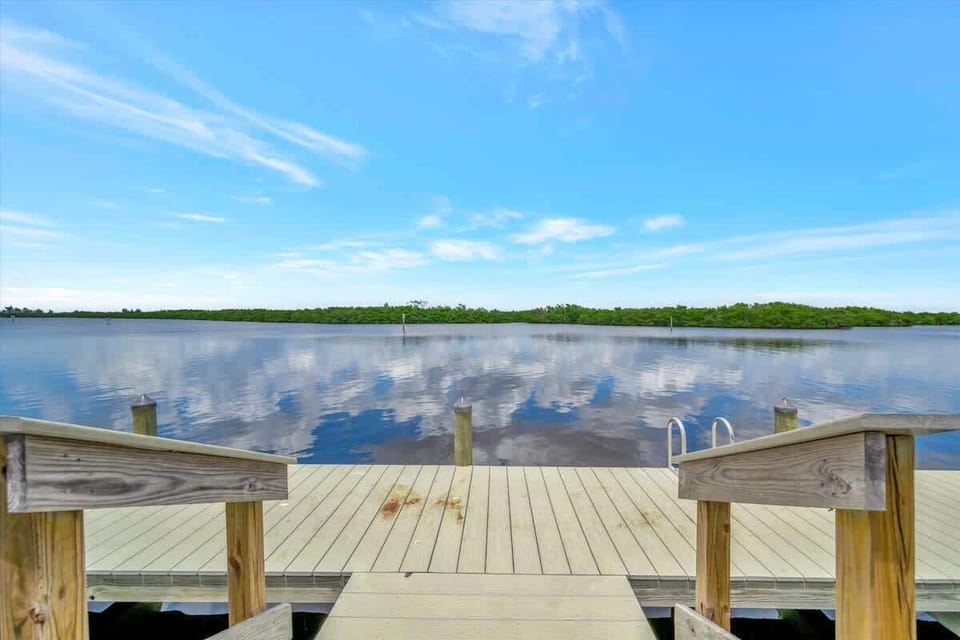 Step down to the peaceful dock and enjoy the serene waterfront.